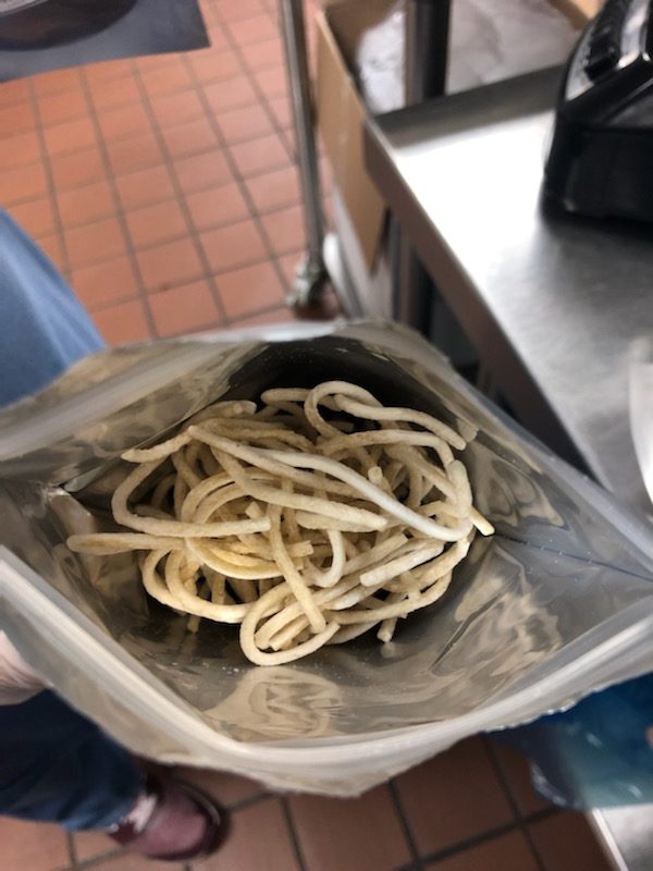 8Glueten-free brown rice pasta labeled bag
